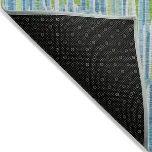 Photo of Aqua Teal Blue And Lime Green Abstract Washable Indoor Outdoor Area Rug