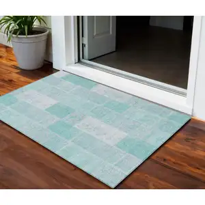 Photo of Aqua Teal Blue And Silver Patchwork Washable Indoor Outdoor Area Rug