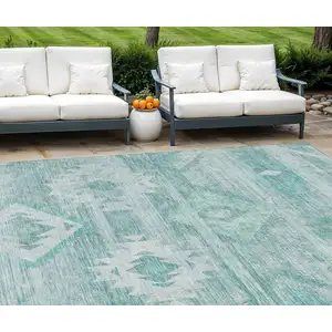 Photo of Aqua Turquoise And Ivory Southwestern Washable Indoor Outdoor Area Rug