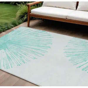 Photo of Aquamarine And Ivory Abstract Washable Indoor Outdoor Area Rug