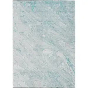 Photo of Aquamarine Aqua And Ivory Abstract Washable Indoor Outdoor Area Rug