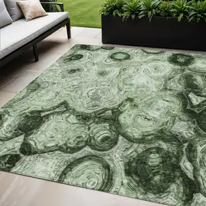 Photo of Artichoke Green And Emerald Abstract Washable Indoor Outdoor Area Rug