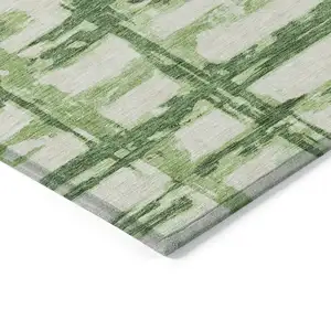 Photo of Artichoke Green And Emerald Striped Washable Indoor Outdoor Area Rug