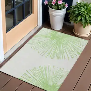 Photo of Artichoke Green And Ivory Abstract Washable Indoor Outdoor Area Rug