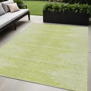 Photo of Artichoke Green And Ivory Abstract Washable Indoor Outdoor Area Rug