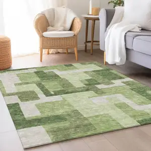 Photo of Artichoke Green And Ivory Abstract Washable Indoor Outdoor Area Rug