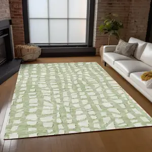 Photo of Artichoke Green And Ivory Abstract Washable Indoor Outdoor Area Rug