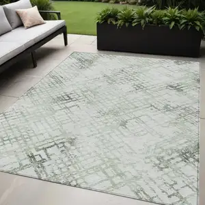 Photo of Artichoke Green And Ivory Geometric Washable Indoor Outdoor Area Rug