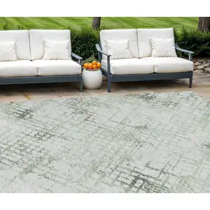 Photo of Artichoke Green And Ivory Geometric Washable Indoor Outdoor Area Rug