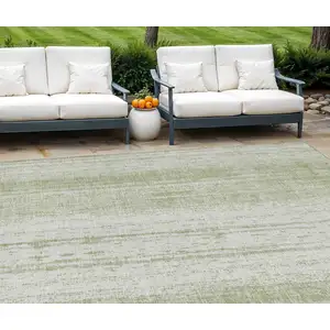 Photo of Artichoke Green And Ivory Striped Washable Indoor Outdoor Area Rug