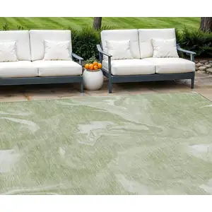 Photo of Artichoke Green Fern Green And Ivory Abstract Washable Indoor Outdoor Area Rug