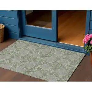 Photo of Artichoke Green Gray And Taupe Floral Washable Indoor Outdoor Area Rug