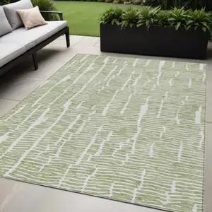 Photo of Artichoke Green Green And Ivory Abstract Washable Indoor Outdoor Area Rug