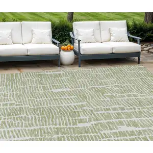 Photo of Artichoke Green Green And Ivory Abstract Washable Indoor Outdoor Area Rug