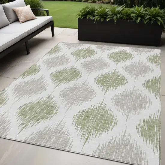 Artichoke Green Ivory And Gray Ikat Washable Indoor Outdoor Area Rug Photo 1