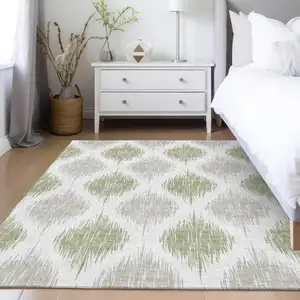 Photo of Artichoke Green Ivory And Gray Ikat Washable Indoor Outdoor Area Rug