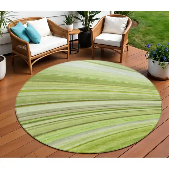 8' Artichoke Green And Olive Green Round Abstract Washable Indoor Outdoor Area Rug Photo 1