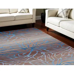 Photo of Beige Abstract Area Rug