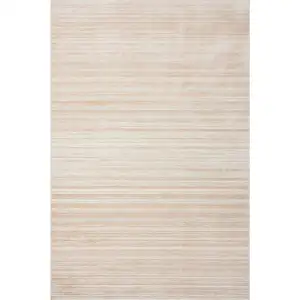 Photo of Beige Abstract Distressed Area Rug