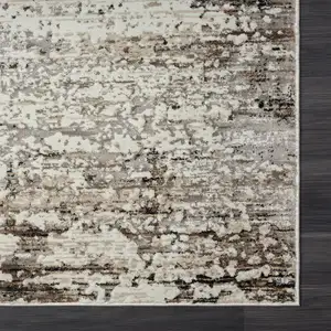 Photo of Beige Abstract Distressed Area Rug