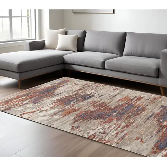 Beige Rust and Blue Abstract Power Loom Area Rug Photo 1