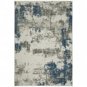 Photo of Beige Abstract Stain Resistant Indoor Outdoor Area Rug