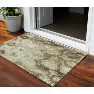 Photo of Beige Abstract Washable Indoor Outdoor Area Rug