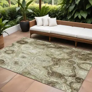 Photo of Beige Abstract Washable Indoor Outdoor Area Rug