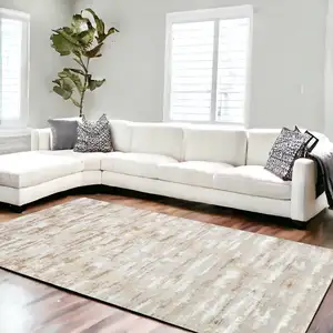 Photo of Beige Abstract Washable Non Skid Area Rug With Fringe