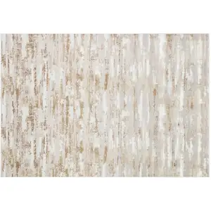 Photo of Beige Abstract Washable Non Skid Area Rug With Fringe