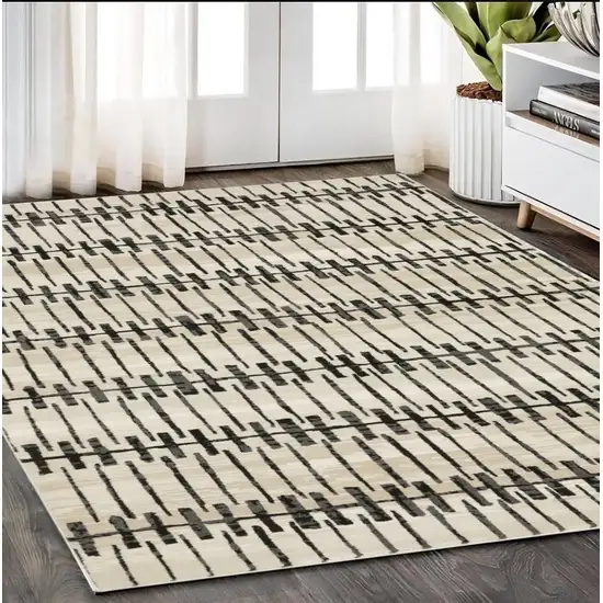 Beige And Black Geometric Area Rug Photo 1