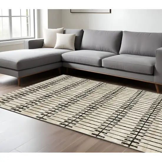 Beige And Black Geometric Area Rug Photo 1