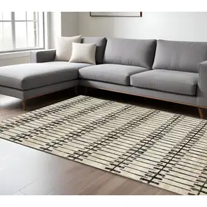 Photo of Beige And Black Geometric Area Rug