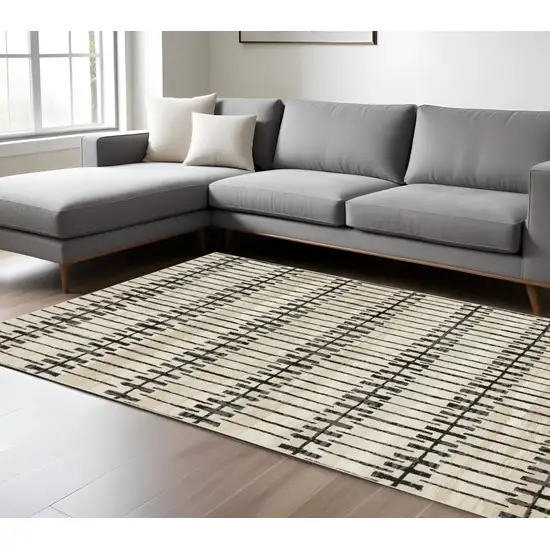 Beige And Black Geometric Area Rug Photo 1