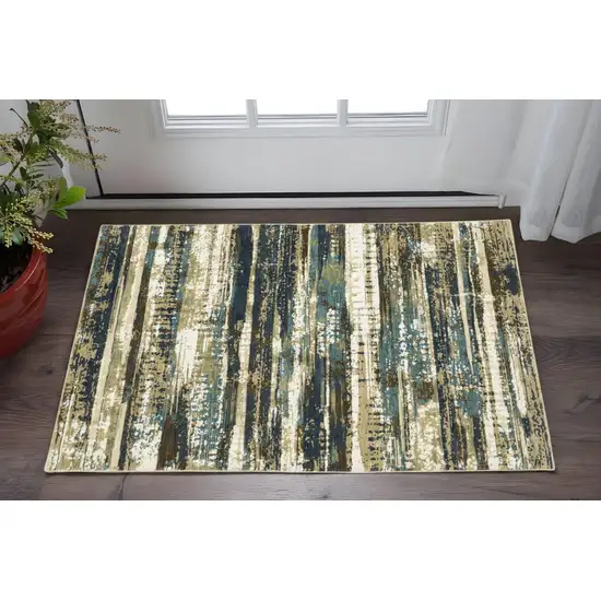 Beige And Blue Abstract Area Rug Photo 1