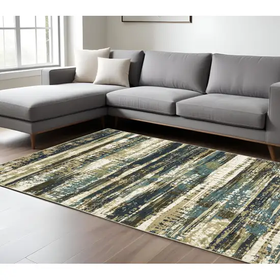 Beige And Blue Abstract Area Rug Photo 1