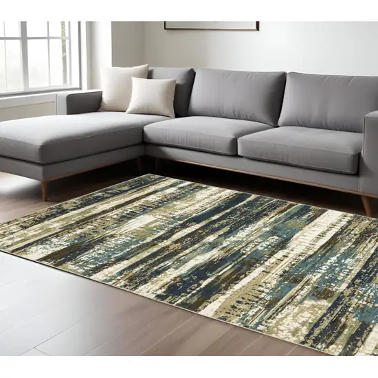 Beige And Blue Abstract Area Rug Photo 1