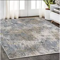 Photo of Beige And Blue Abstract Distressed Area Rug With Fringe