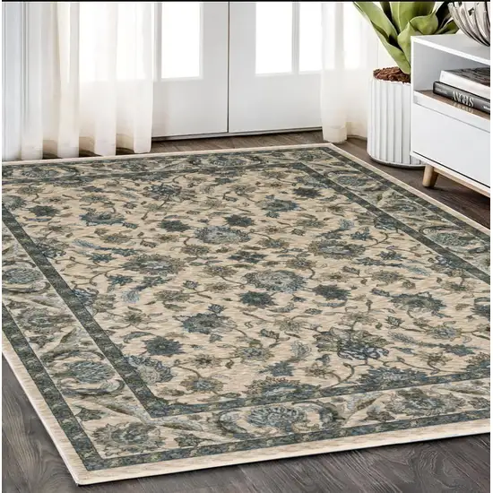 Beige And Blue Oriental Area Rug With Fringe Photo 1