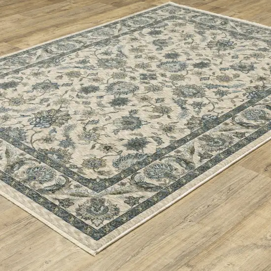 Beige And Blue Oriental Area Rug With Fringe Photo 7