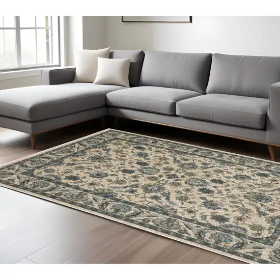 Beige And Blue Oriental Area Rug With Fringe Photo 1