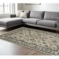 Photo of Beige And Blue Oriental Area Rug With Fringe