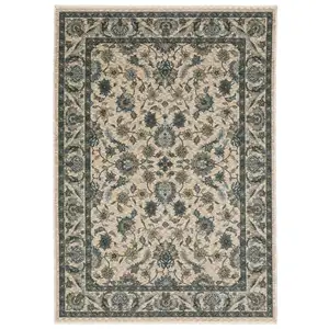 Photo of Beige And Blue Oriental Area Rug With Fringe