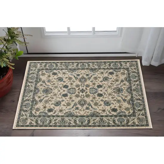 Beige And Blue Oriental Area Rug With Fringe Photo 1