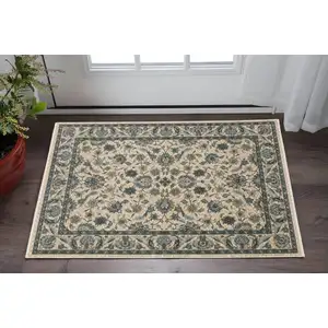 Photo of Beige And Blue Oriental Area Rug With Fringe