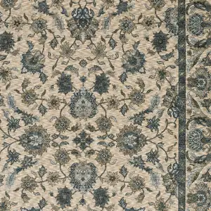 Photo of Beige And Blue Oriental Area Rug With Fringe