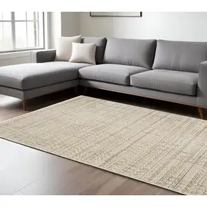 Photo of Beige And Brown Geometric Area Rug With Fringe