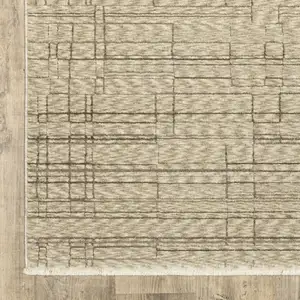 Photo of Beige And Brown Geometric Area Rug With Fringe