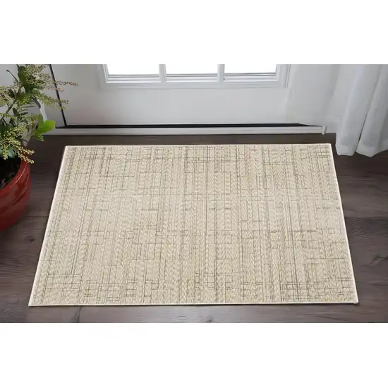 Beige And Brown Geometric Area Rug With Fringe Photo 1