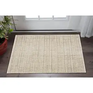 Photo of Beige And Brown Geometric Area Rug With Fringe